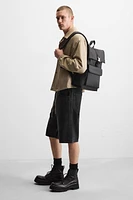RUBBERIZED FLAP BACKPACK