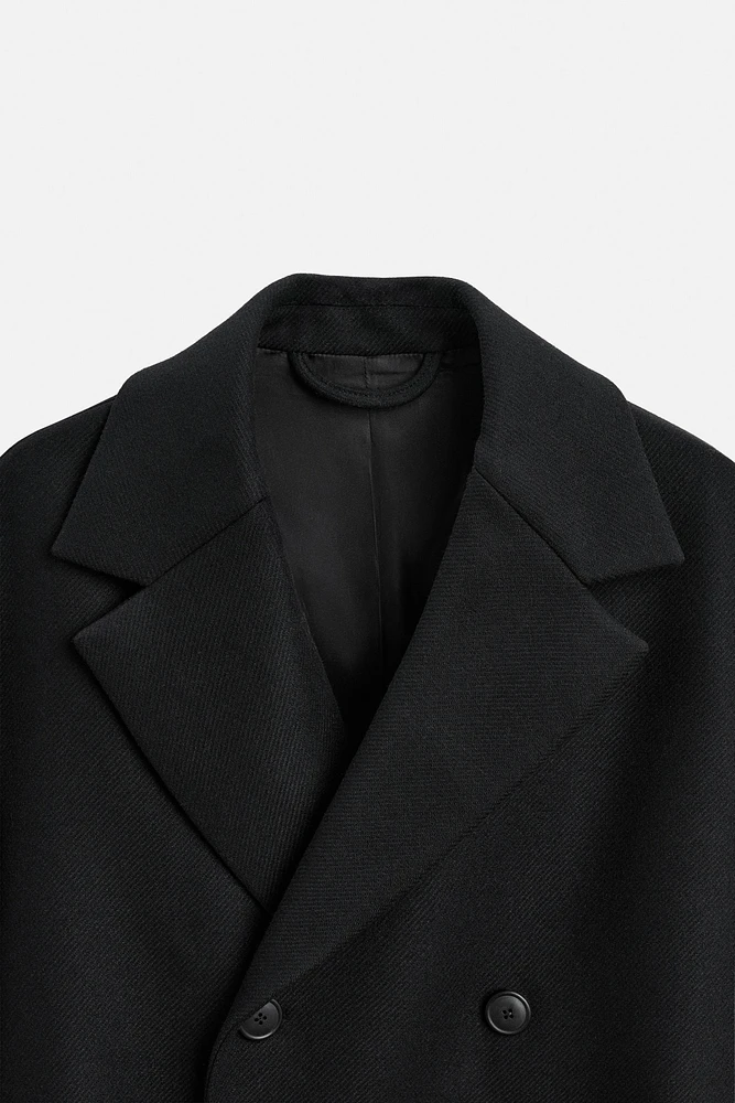 MANTEAU À BOUTONNAGE CROISÉ AVEC CEINTURE