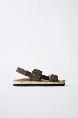 SANDALES EN CUIR À BOUCLES ET JUTE