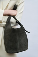 ASYMMETRIC SOFT SUEDE MINI BUCKET BAG