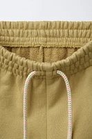 PLUSH PIPED SHORTS