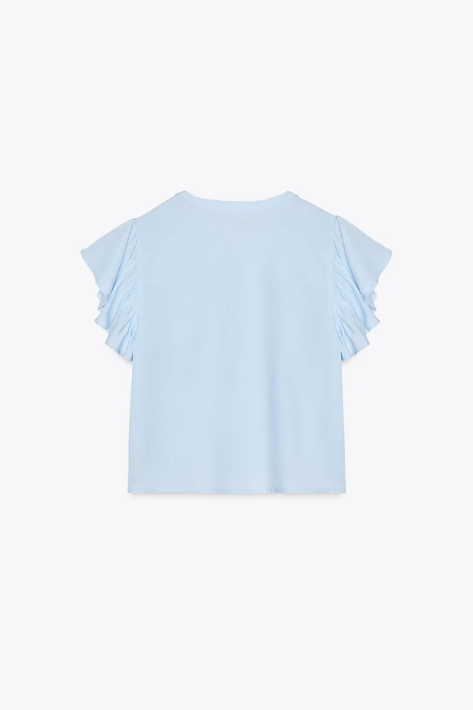 CHEMISE MANCHES COURTES VOLANT