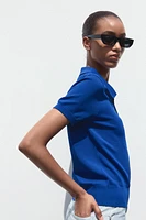TOP POLO EN MAILLE À MANCHES COURTES
