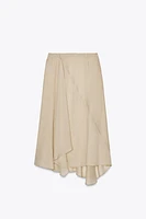 JUPE FLUIDE SEMI-TRANSPARENTE