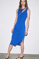 CUT OUT KNIT DRESS WITH JEWELS