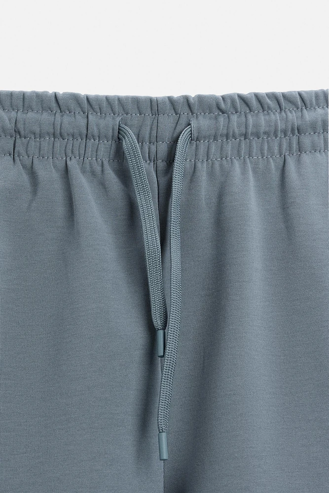 INTERLOCK STRUCTURED SHORTS