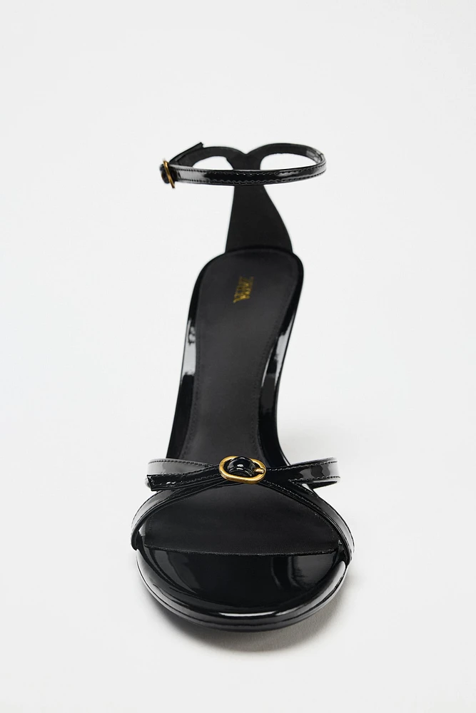 HIGH HEELED BUCKLE SANDALS