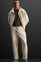 TECHNICAL ZIPPER JOGGER PANTS