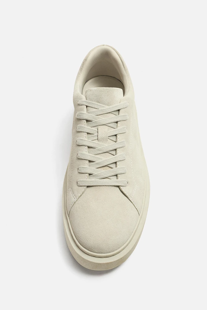 TENNIS VOLUME CUIR