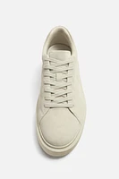 TENNIS VOLUME CUIR