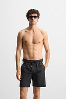 STRIPED LONG SWIM TRUNKS