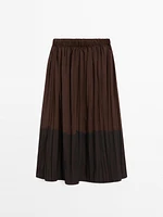 Long flowing pleated skirt