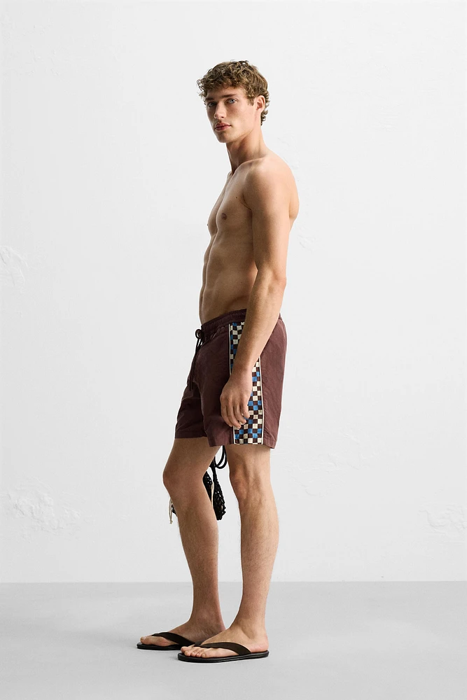 LONG SWIMSUIT WITH CONTRAST STRIPE