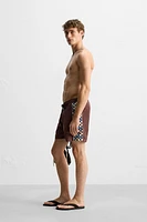 LONG SWIMSUIT WITH CONTRAST STRIPE