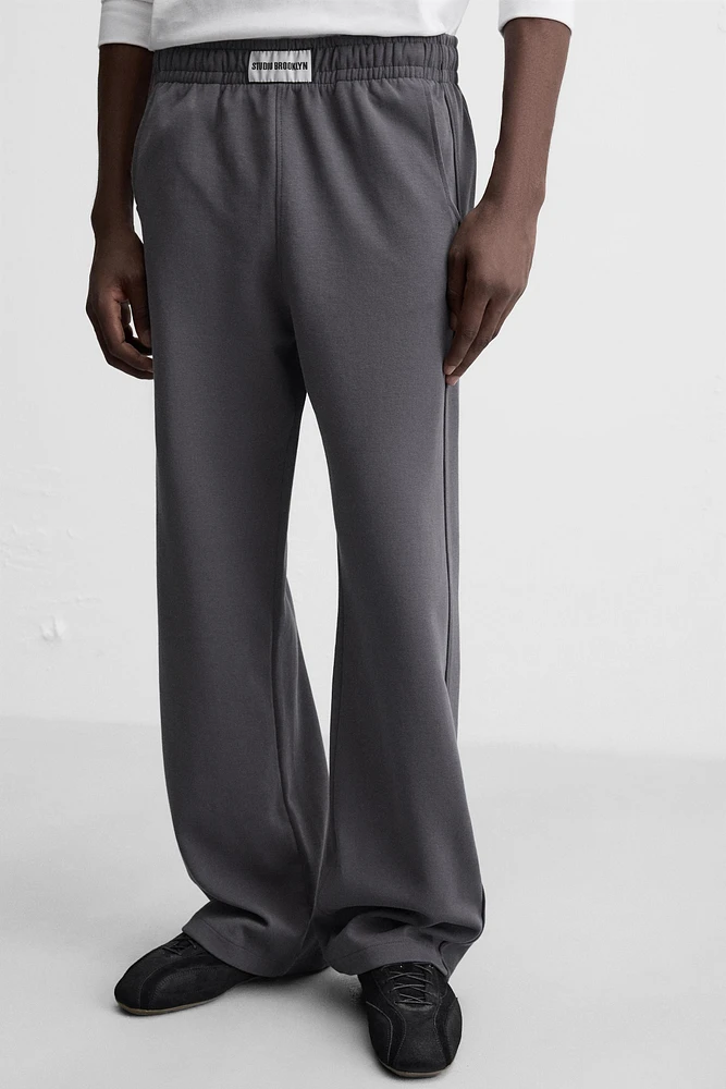 PATCH INTERLOCK PANTS