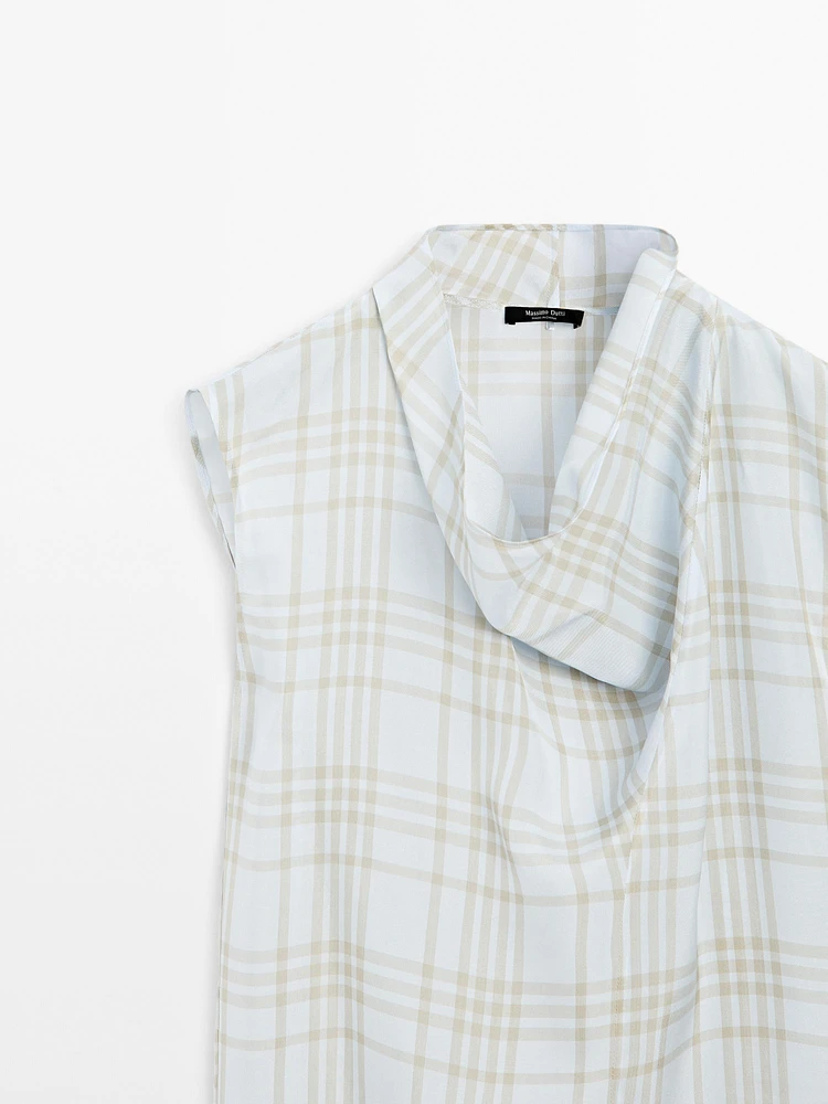 Draped neck check top