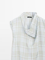 Draped neck check top