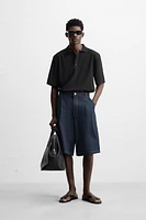 FLOWY POLO SHIRT