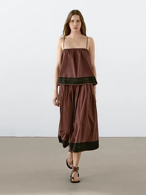 Short strappy top with ribbon details