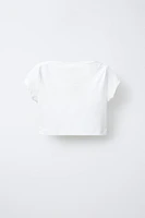 TOP CROPPED UNI ÉLASTIQUE