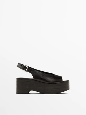 Sandales compensées en bois type mules