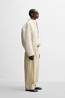 LIMITED EDITION RELAXED FIT PLEATED PANTS