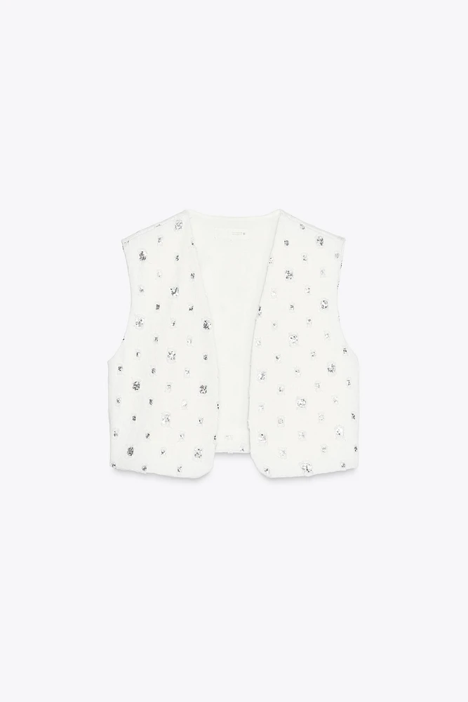 GILET COURT À SEQUINS