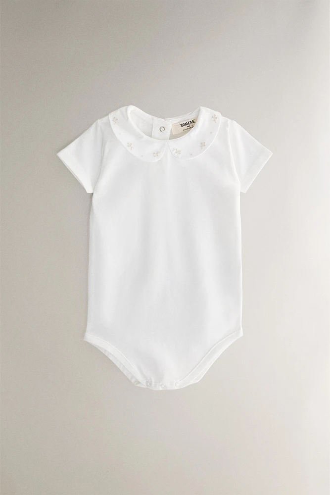 BAVOIR ENFANT BRODERIE FLEURS