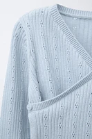 GILET EN MAILLE CROISÉ AJOURÉ