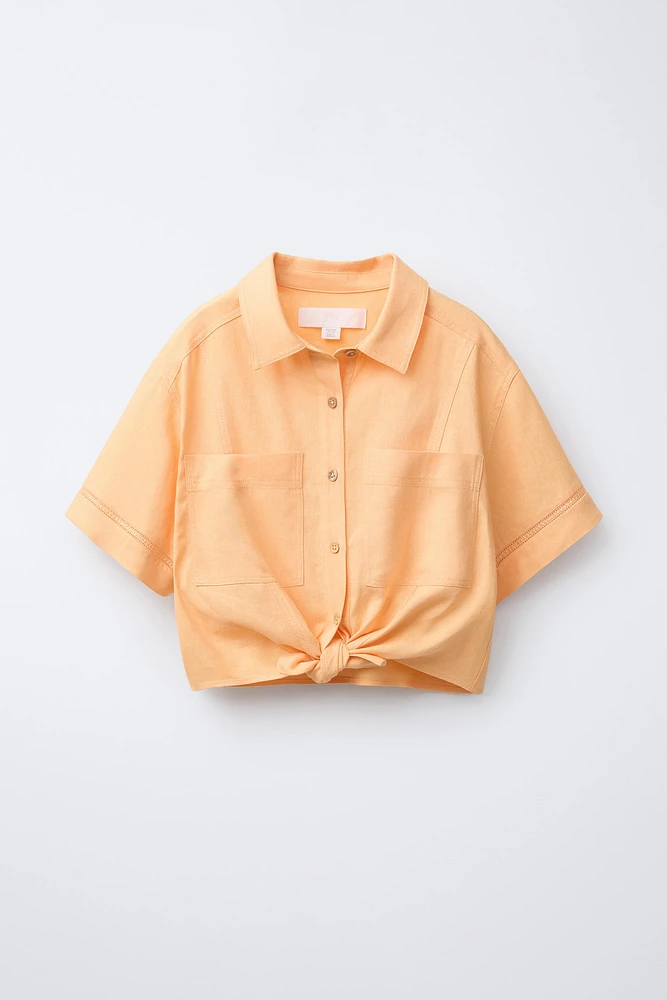 CHEMISE À NŒUD CONTENANT DU LIN