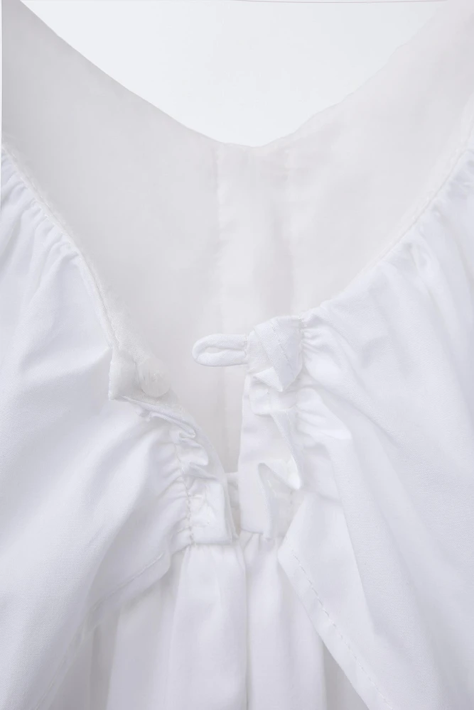 ROBE À VOLANT