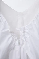 ROBE À VOLANT