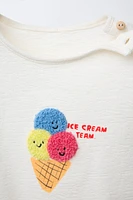 RUFFLY ICE CREAM ROMPER