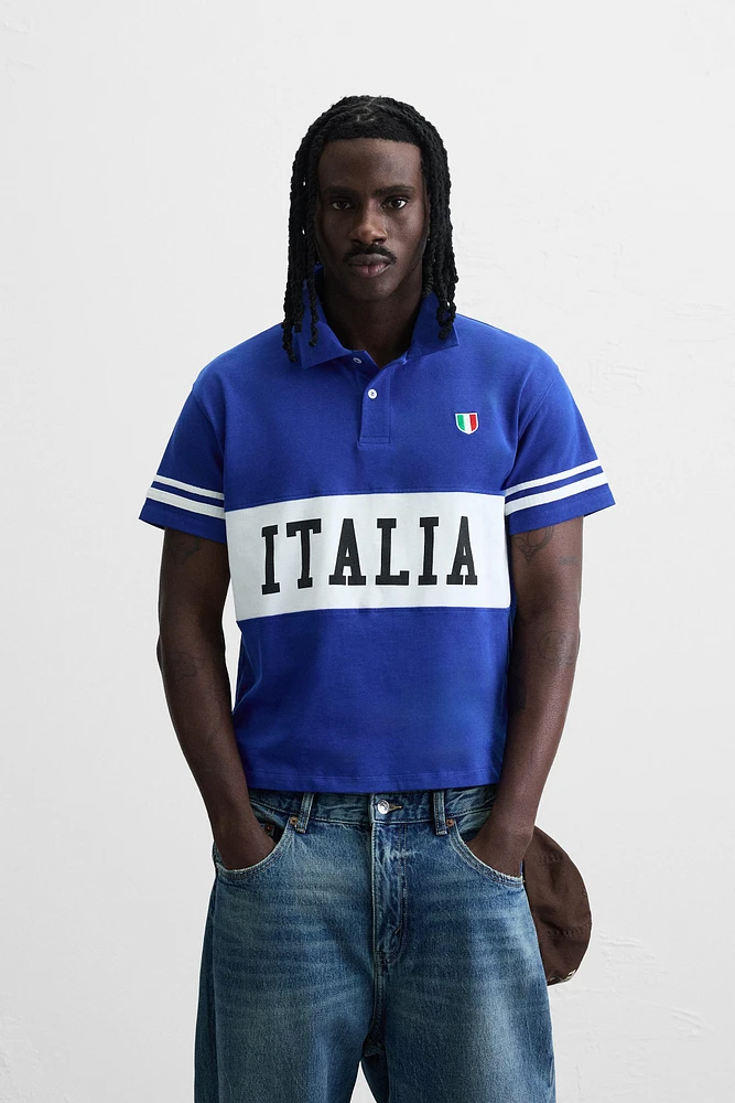 POLO COLOR BLOCK AVEC DRAPEAU