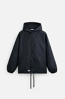 HOODED TECHNICAL JACKET