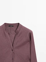 Flowing linen shirt with stand collar