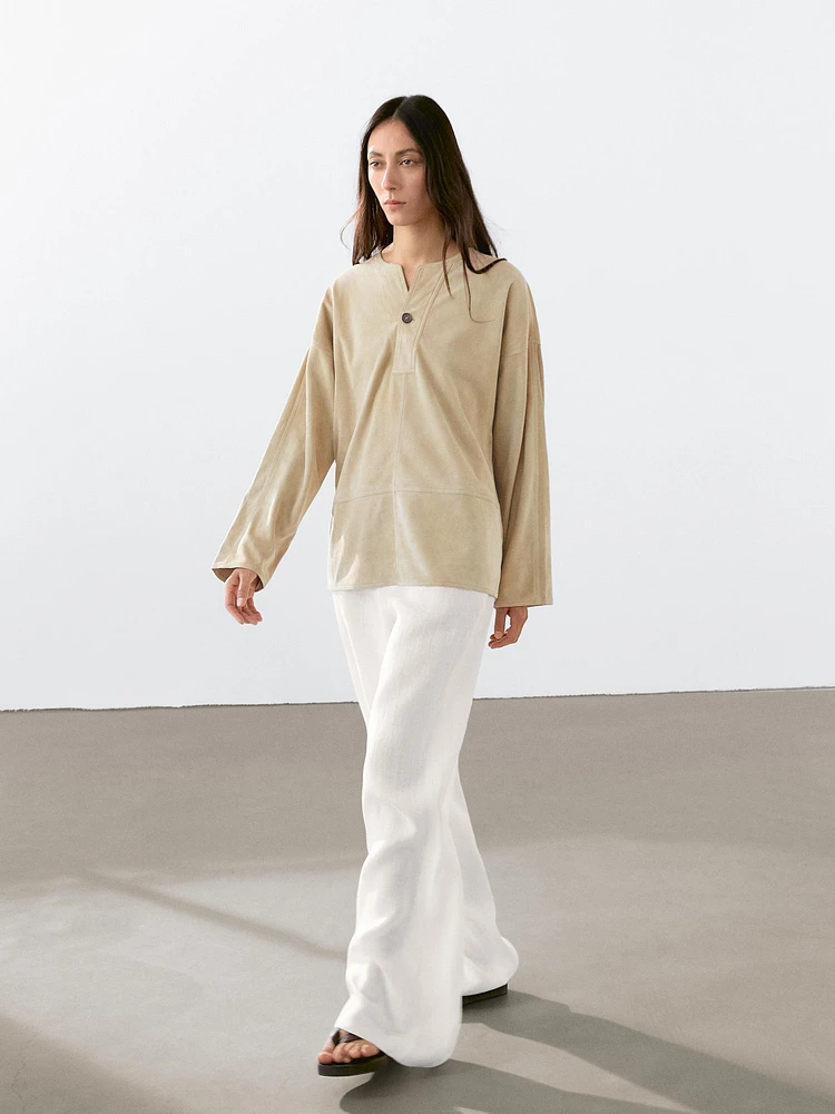 Blouse large en cuir finition daim