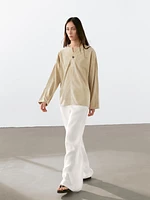 Blouse large en cuir finition daim