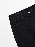 Tapered-fit denim trousers