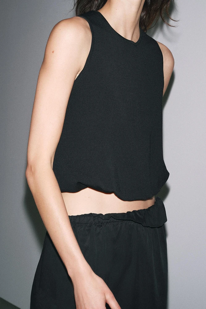 PUFFY HEM KNIT TOP