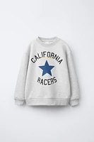 STAR PATCH PRINT SWEATSHIRT