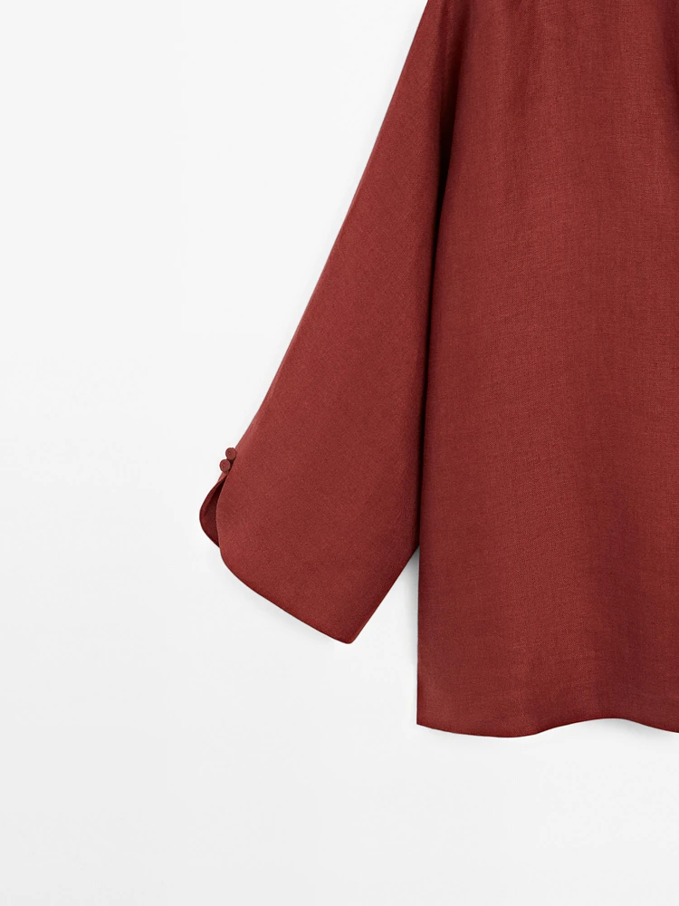 Blouse à col en V 100 % lin