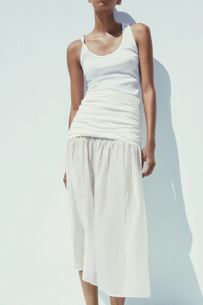 COMBINATION MIDI SKIRT