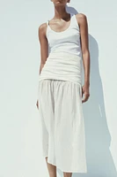COMBINATION MIDI SKIRT