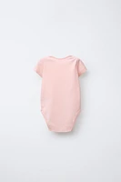 LOT DE CINQ BODYS CANETONS