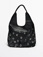 Nappa leather bag with eyelets