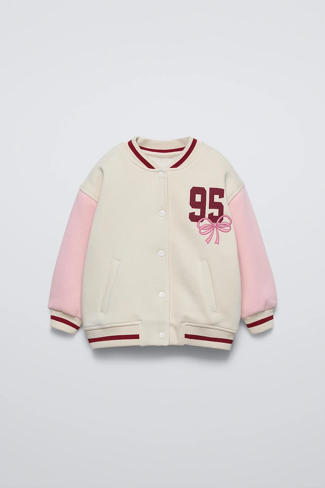 BOMBER JACKET WITH EMBROIDERED BOW