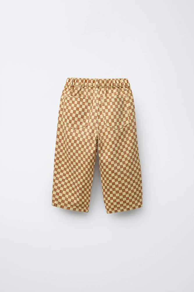 PANTALON EN SERGÉ À CARREAUX DAMIER