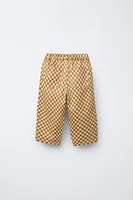 PANTALON EN SERGÉ À CARREAUX DAMIER