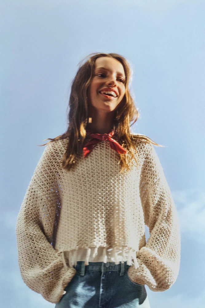 PULL EN MAILLE RÉSILLE À FRANGES